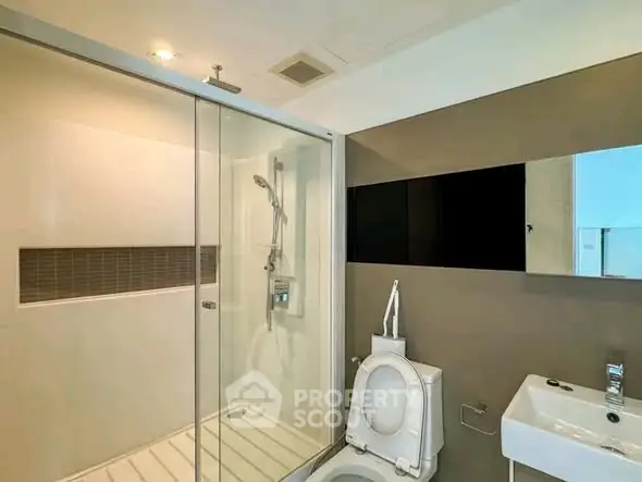 Modern bathroom with sleek shower and minimalist design