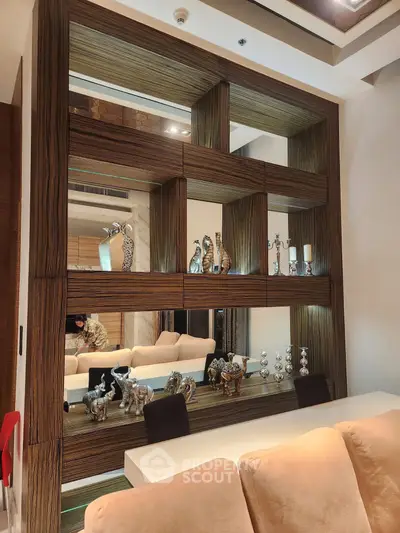 Elegant living room with stylish wooden shelving and decorative accents