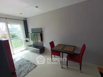 Modern living room with balcony access and stylish decor