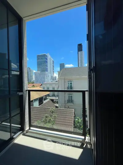 Charming balcony with city skyline view, perfect for urban living enthusiasts.