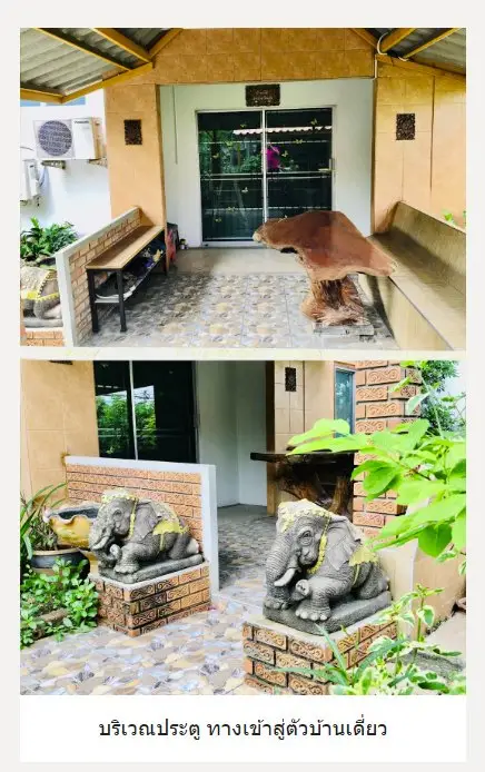 Charming entrance with elephant statues and rustic decor, inviting ambiance for a cozy home.