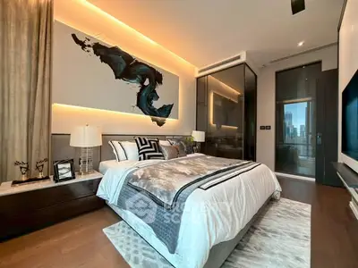 Luxurious modern bedroom with elegant decor and city view.