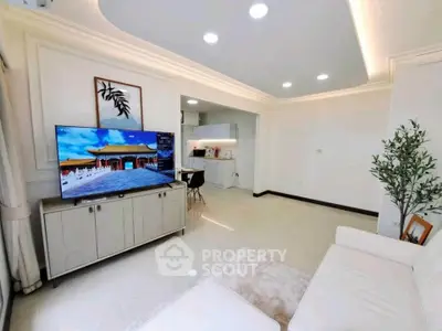 Spacious modern living room with elegant decor and natural light