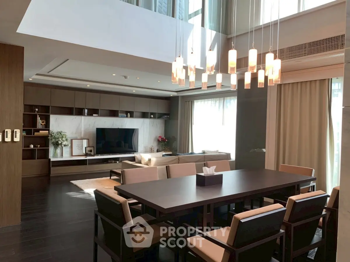 Luxurious modern living room with elegant dining area and stylish lighting