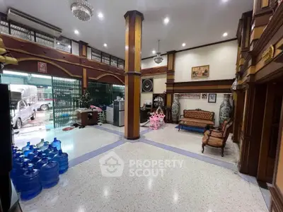 Spacious living room with high ceilings and elegant decor in a luxurious property