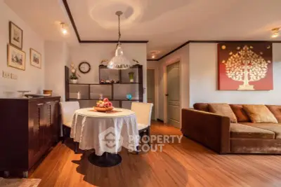 Charming living room with elegant decor and cozy seating area, perfect for relaxation and entertaining.
