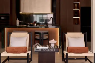 Luxurious modern living room with elegant furniture and stylish kitchen backdrop