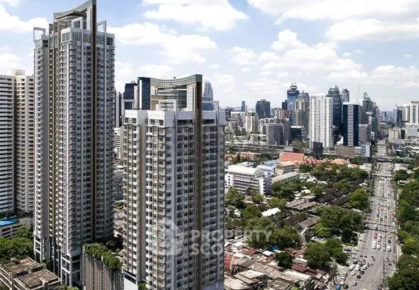 Stunning high-rise apartment buildings with cityscape views in a bustling urban area.