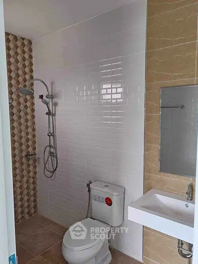 Modern bathroom with sleek fixtures and stylish tile design