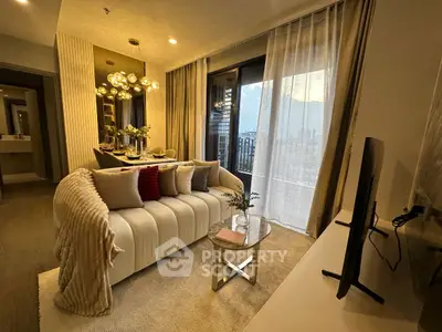 Luxurious living room with elegant decor and city view, featuring plush sofa and modern lighting.