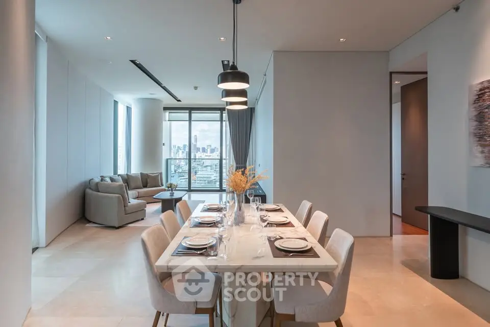 Luxurious modern dining area with city view, elegant table setting, and spacious living room.