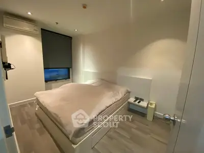 Modern bedroom with minimalist design and cozy ambiance