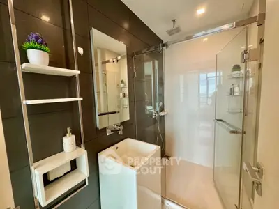 Modern bathroom with sleek glass shower and stylish fixtures