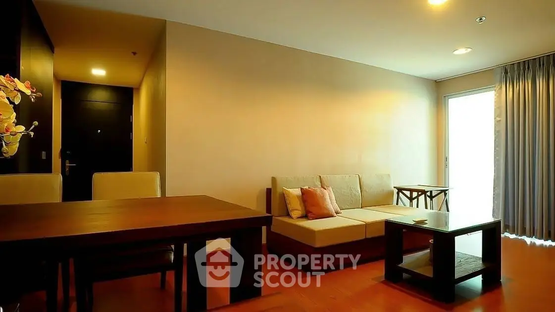 Cozy living room with modern furniture and warm lighting, perfect for relaxation and entertaining.