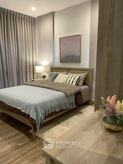 Cozy modern bedroom with elegant decor and soft lighting