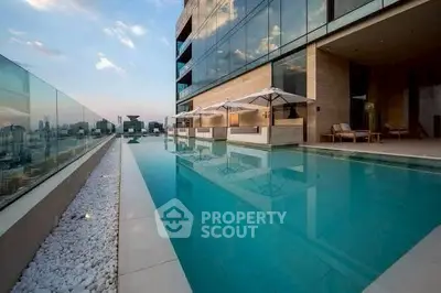 Luxurious rooftop pool with stunning city views and modern design.