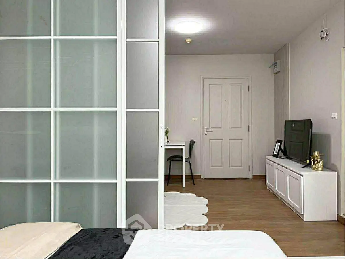 Modern apartment interior with stylish living area and sleek furniture