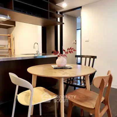 Chic modern kitchen with stylish dining area and wooden furniture