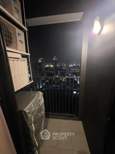 Stunning cityscape view from a modern high-rise balcony at night, perfect for urban living.