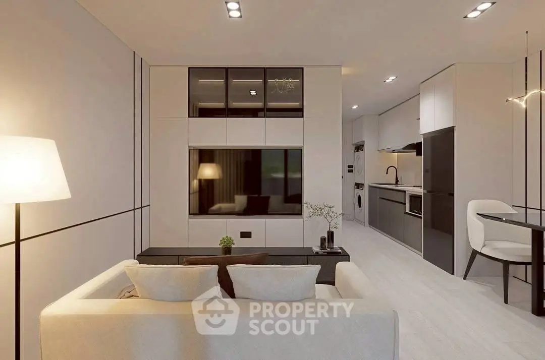 Modern living room with sleek kitchen, open layout, and stylish decor