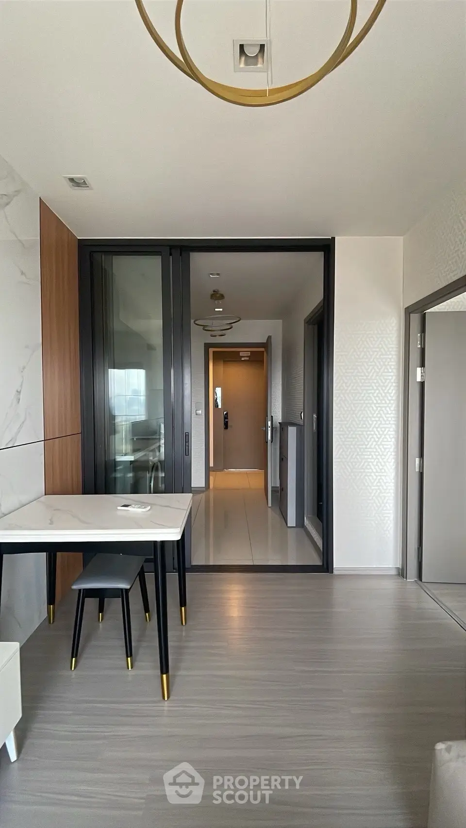 Modern apartment interior with sleek dining area and stylish decor