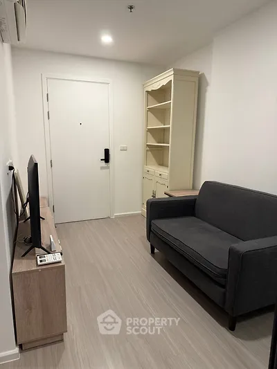 Cozy living room with modern furniture and sleek flooring
