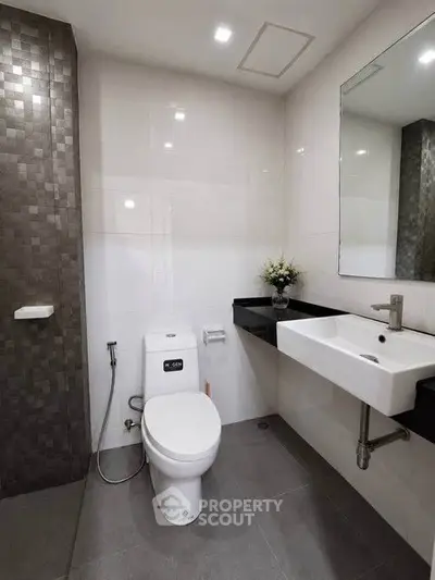 Modern bathroom with sleek fixtures and elegant tile design