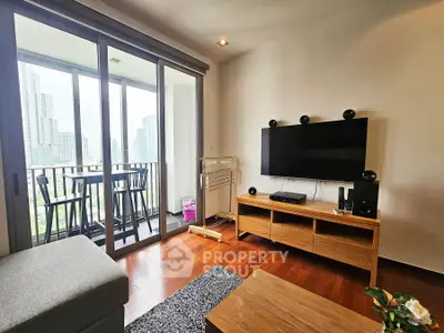 Modern living room with balcony view in high-rise apartment