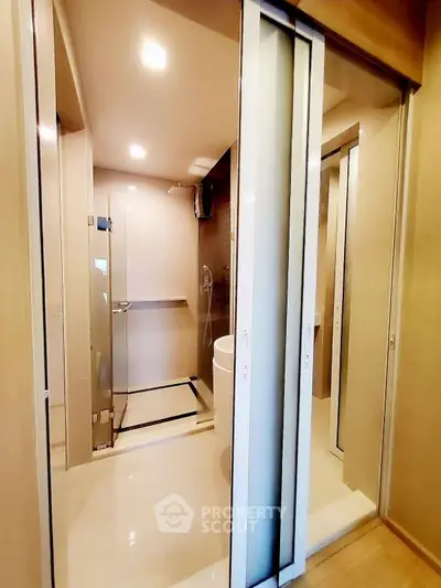 Modern bathroom with sleek design and glass shower enclosure