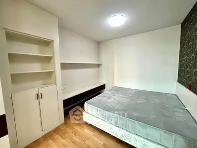 Spacious bedroom with built-in storage and modern design