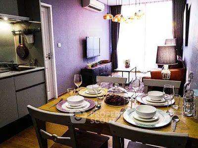 Chic modern living room with dining area, stylish decor, and ample natural light.