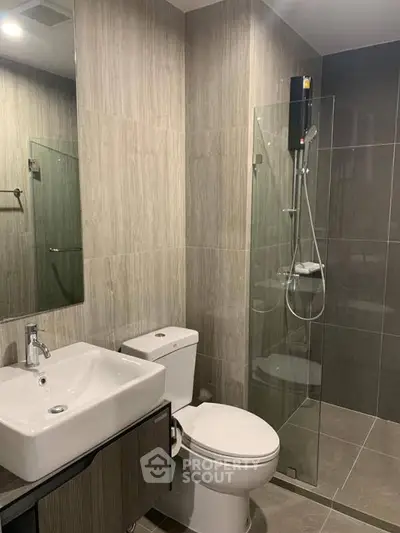 Modern bathroom with sleek design and glass shower enclosure