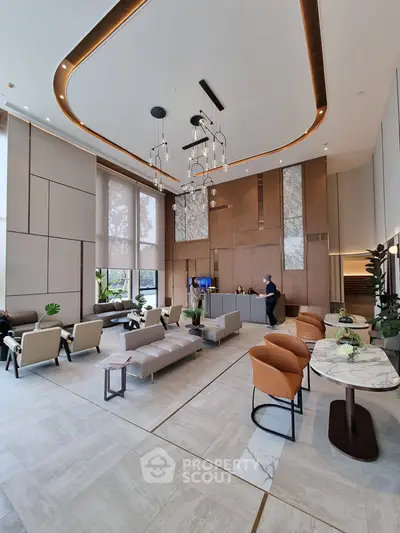 Luxurious modern lobby with elegant seating and high ceilings