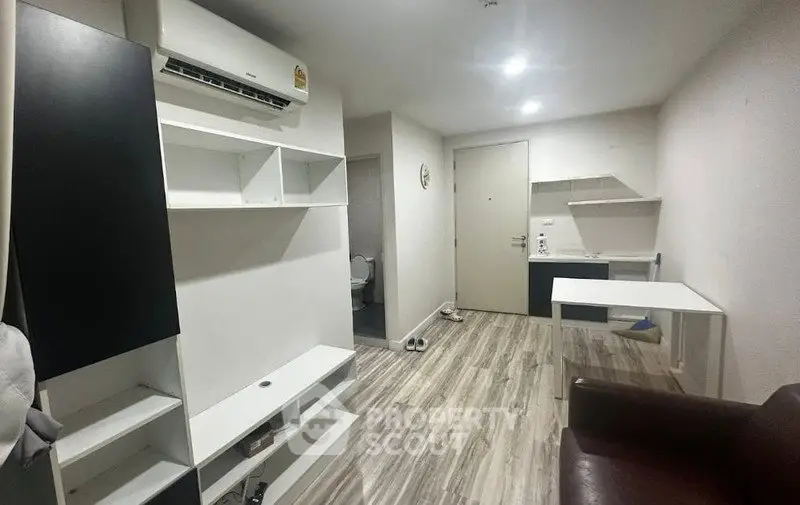 Modern apartment interior with sleek flooring and minimalist design