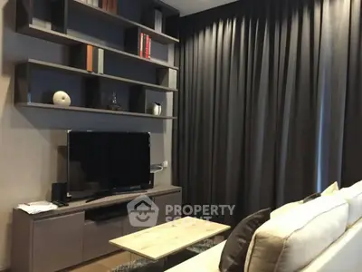 Modern living room with sleek TV unit and stylish shelving