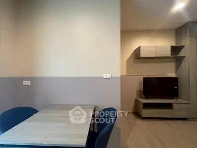 Modern minimalist living space with sleek furniture and neutral tones, perfect for urban living.
