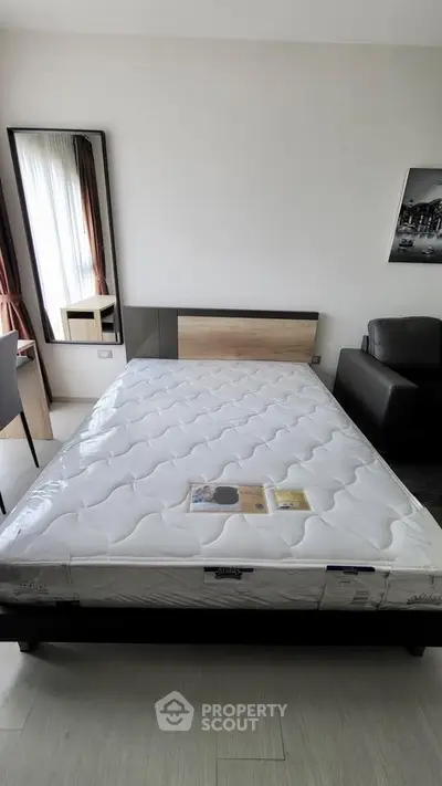 Modern bedroom with a comfortable bed and stylish decor