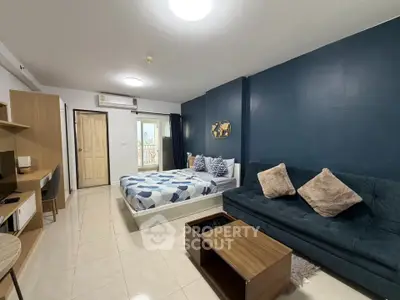 Modern studio apartment with stylish decor and cozy furnishings