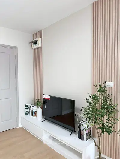 Modern living room with sleek TV setup and stylish decor