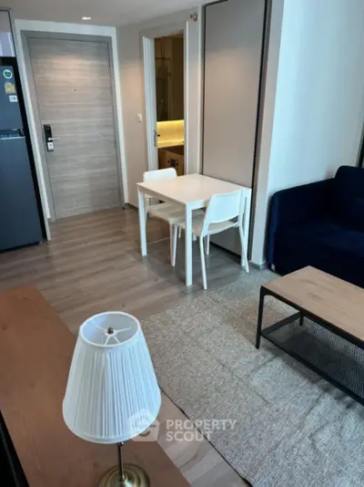 Modern apartment interior with dining area and cozy living space