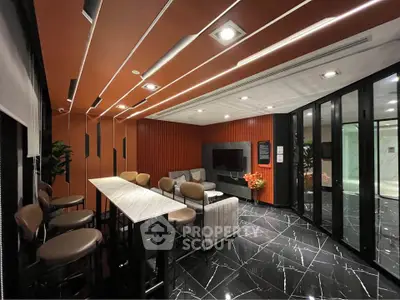 Modern lounge area with stylish seating and sleek design