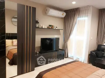 Modern bedroom with stylish decor, TV unit, and large window with curtains.