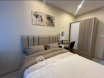 Cozy bedroom with elegant decor and modern furniture, perfect for relaxation.