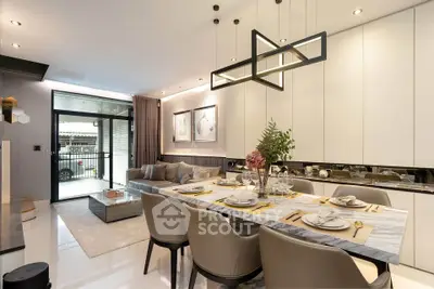 Luxurious modern dining room with elegant decor and open layout, perfect for entertaining guests.