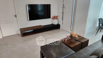 Modern living room with sleek TV setup and stylish decor