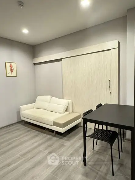 Modern living room with sleek furniture and minimalist design