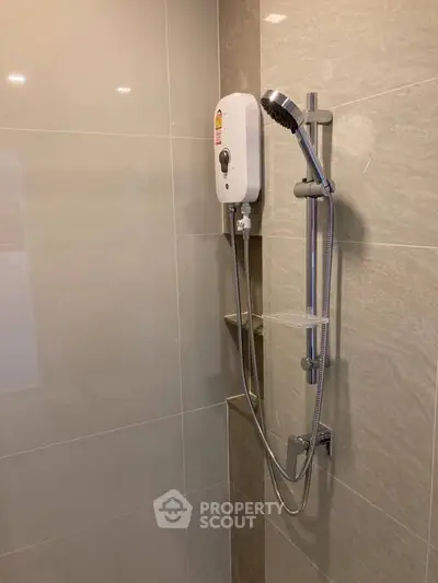 Modern bathroom with sleek showerhead and water heater