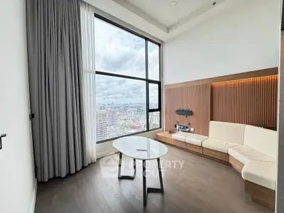 Modern living room with panoramic city view and stylish furniture