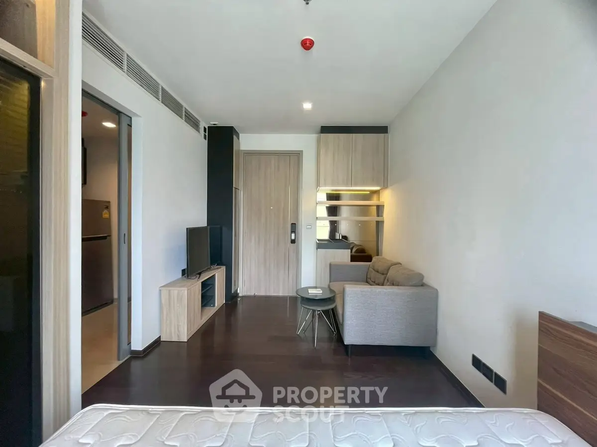 Modern studio apartment with sleek design and cozy living area