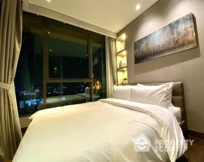 Luxurious bedroom with city view, modern decor, and cozy ambiance for ultimate relaxation.